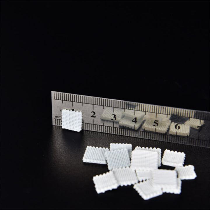 Small white building blocks with a ruler for scale on a black background Eazao Bio Advanced 3D Printer for Viscous Fluids Eazao Bio Advanced 3D Printer for Viscous Fluids Print Size 150x150x240mm | Eazao Clay Ceramic 3D Printer