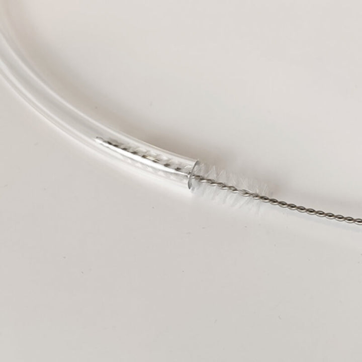 Close-up of a silver chain on a white background Eazao Feed Tube Brush for Eazao 3D Printers Clean Easily | Eazao Clay Ceramic 3D Printer