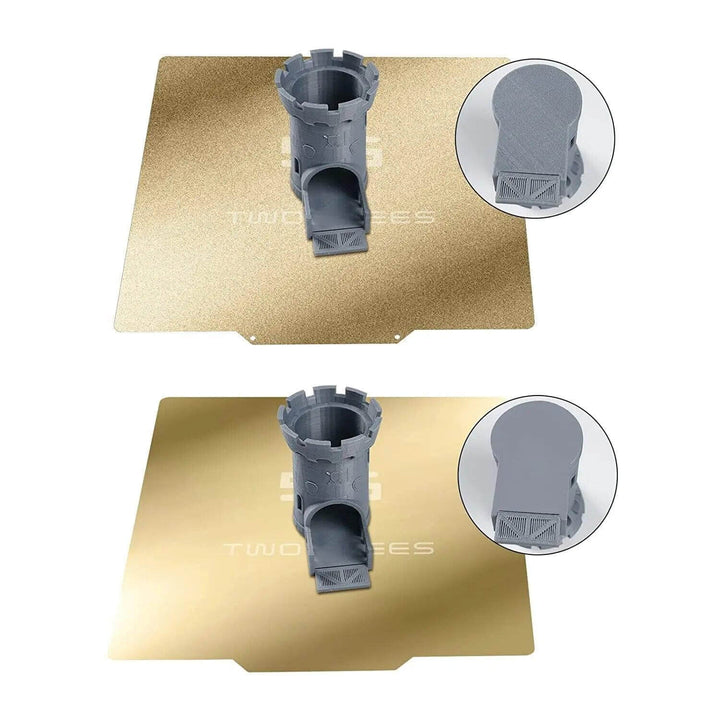 Two gray plastic components on gold mats with 'TWO TRES' branding, on a white background. Twotrees Double-Sided PEI Spring Steel Sheet Magnetic Build Plate for 3D Printers 220-235-310mm | Twotrees 3D Printer Parts Accessories