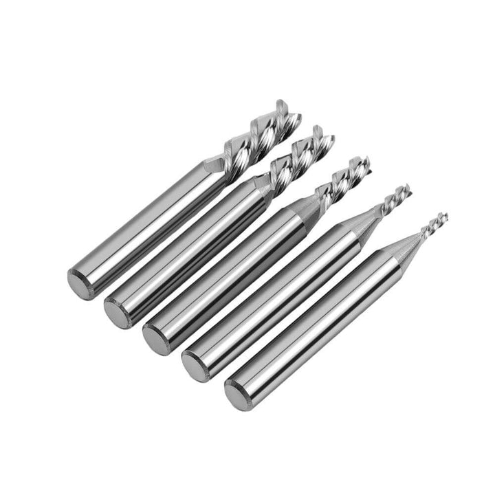 Set of metal drill bits on a white background Twotrees High Quality 5PCS HRC55 3-Flute End Mills Tungsten Carbide CNC Router Bits End Mills | Twotrees CNC Router Bits