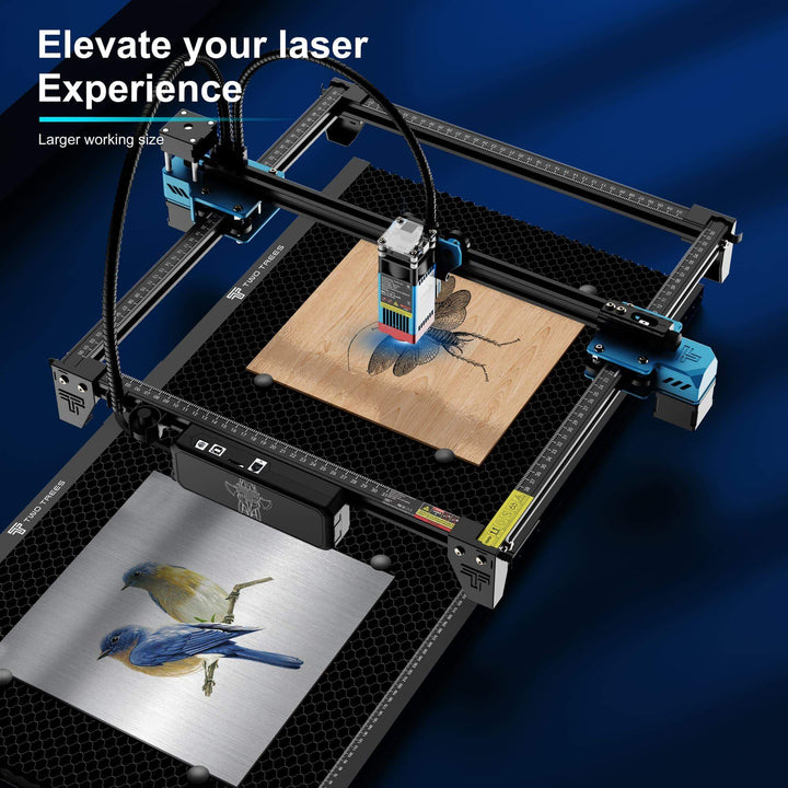 Laser engraving machine with a blue bird design on paper, set against a dark blue gradient background. Twotrees Spliced Honeycomb Panel Workbench 400x400x22mm | Twotrees Laser Engraver Parts Accessories