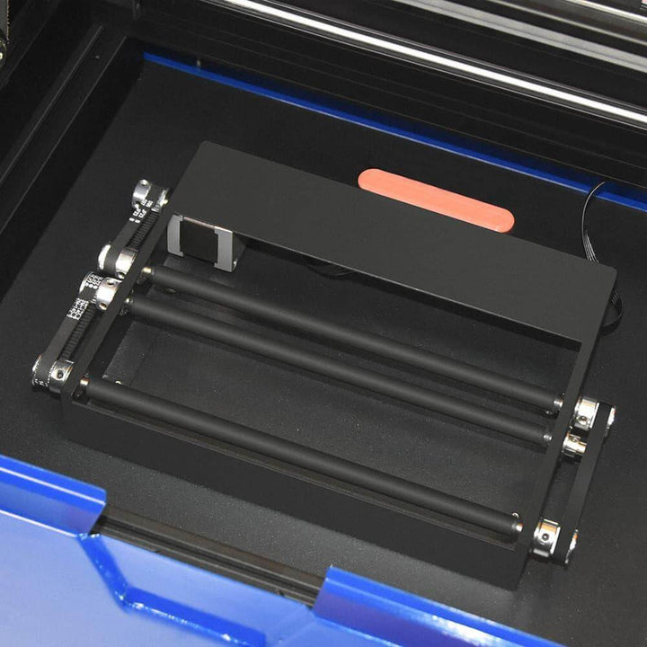 Close-up of a black printer cartridge with metal components on a blue background Twotrees TS3 10W Black Enclosed Diode Laser Engraver - High Precision & Safety | Twotrees Laser Engraver