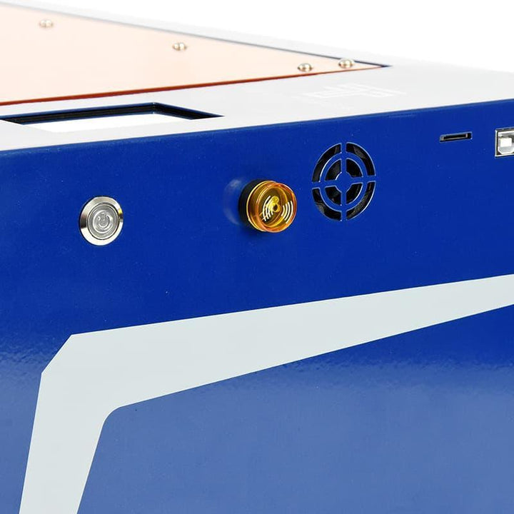 Close-up of a blue and white air hockey table with a gold cup and silver button. Twotrees TS3 10W Blue Diode Enclosed Laser Engraver High Precision Laser Cutting and Engraving | Twotrees Laser Engraver